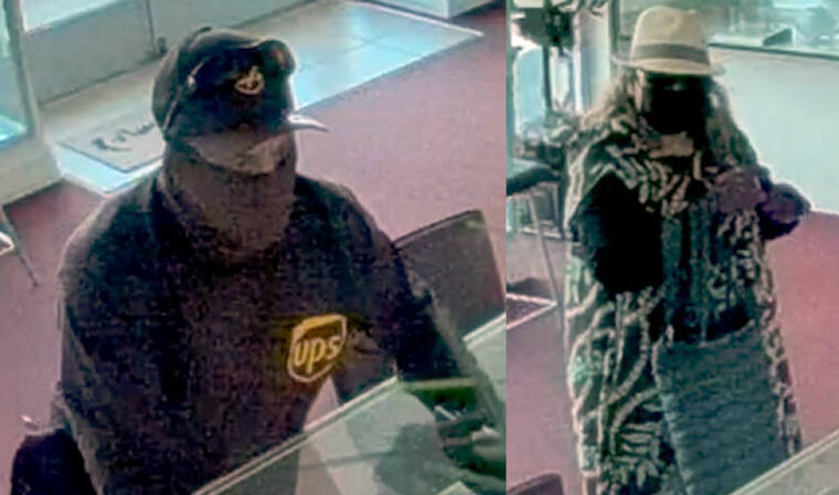 COURTESY CRIMESTOPPERS HONOLULU
Police have released surveillance images of the man and woman who are wanted on suspicion of first-degree robbery.