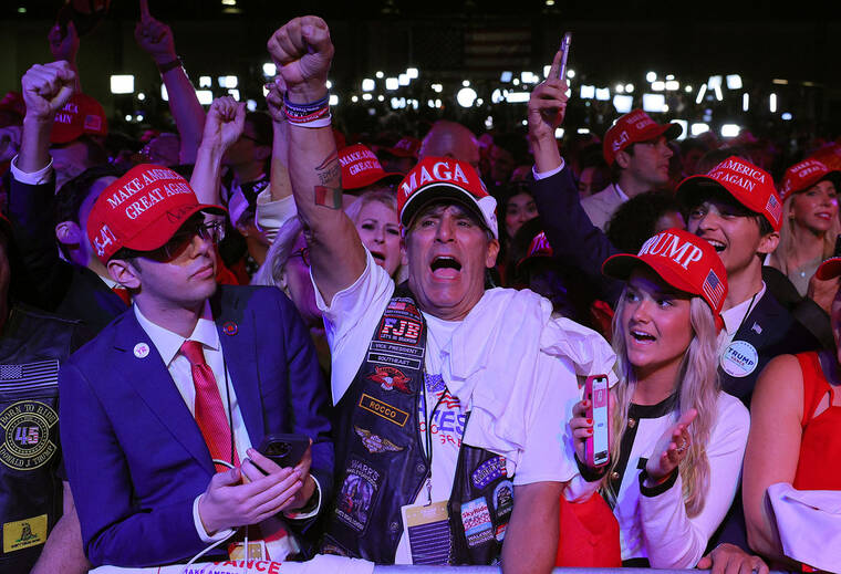 REUTERS/Brian Snyder
Supporters of Republican presidential nominee and former U.S. President Donald Trump react at the site of the Election Night rally for Trump at the Palm Beach County Convention Center in West Palm Beach, Fla.