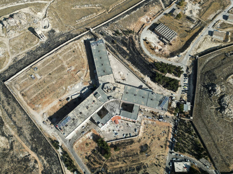 REUTERS/AMMAR AWAD / DEC. 14
                                A drone view shows Sednaya prison, which was known as a slaughterhouse under Syria’s Bashar al-Assad rule, after fighters of the ruling Syrian body ousted Bashar al-Assad, Syria.