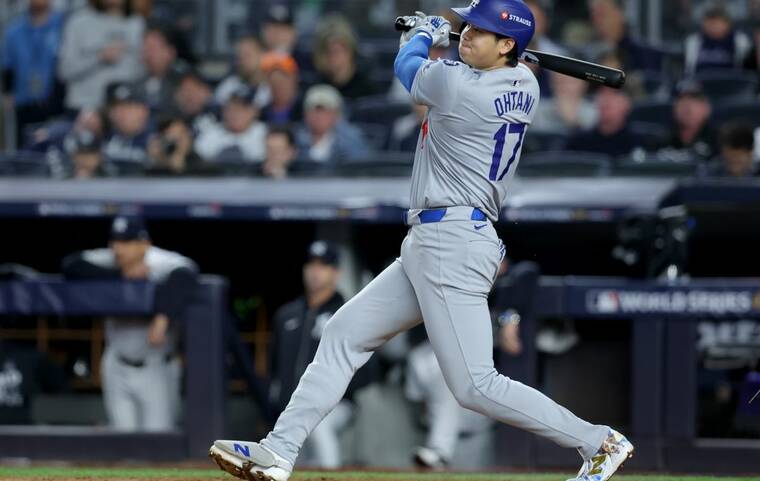 BRAD PENNER-IMAGN IMAGES
Los Angeles Dodgers two-way player Shohei Ohtani hits a single during the fifth inning, Tuesday, against the New York Yankees in game four of the 2024 MLB World Series at Yankee Stadium.